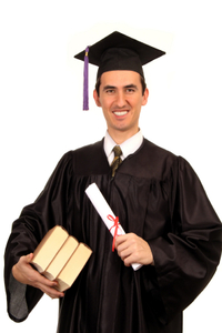 picture of a PhD graduate in cap and gown